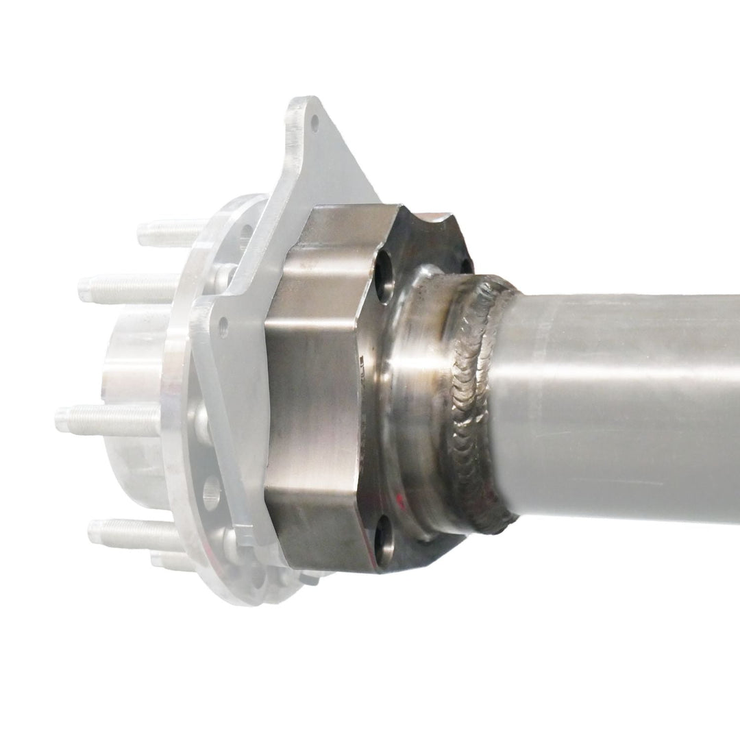 Close-up of 2005+ Ford Super Duty Unit Bearing Conversion Kit with white plastic parts on a white background