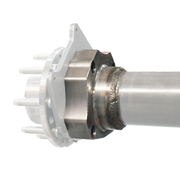 Close-up of 2005+ Ford Super Duty Unit Bearing Conversion Kit with white plastic parts on a white background