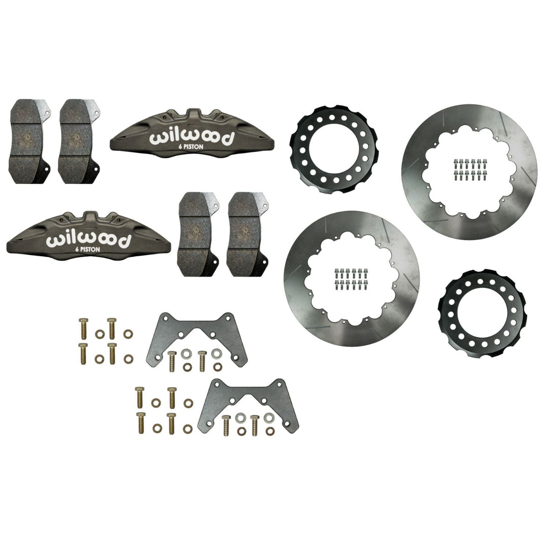 Wilwood 6 piston Super Duty brake kit ncluding calipers, rotors, and hardware on a white background