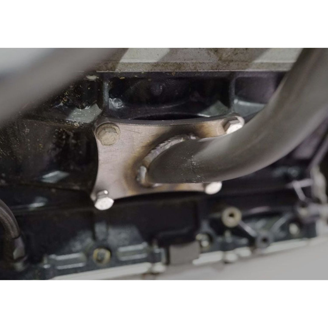 Close-up of chevy LS  universal ls fabrication mounts with a focus on metal parts and bolts.