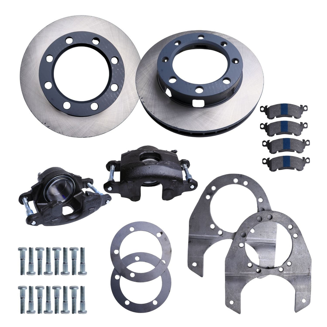 Collection of ford dana 60 3/4 ton brake conversion components including rotors, calipers, pads, and hardware on a white background