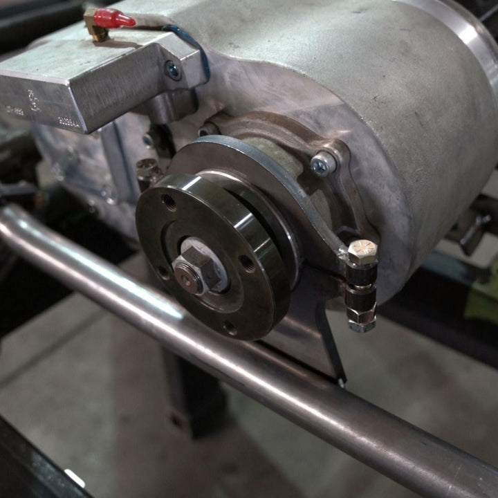 Close-up of a 3/8" weld on transfer case guard in use on an automobile
